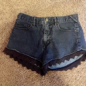 Free people muted black jean shorts